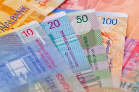 Swiss Franc Gains vs. Euro, Drops vs. Dollar