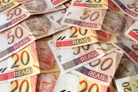 Brazilian Real Jumps After Central Bank Surprises